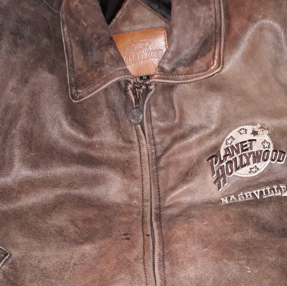 Distressed leather coat